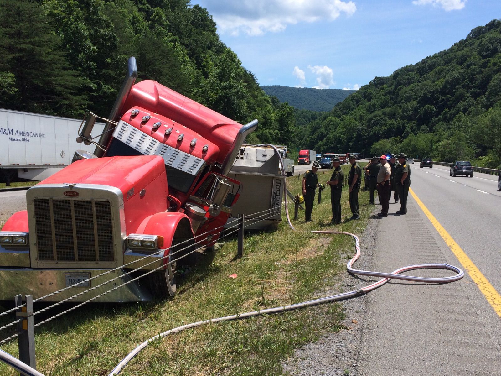 Tractor trailer overturns ...